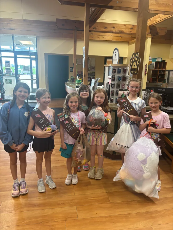 Girl Scouts together after a troop activity